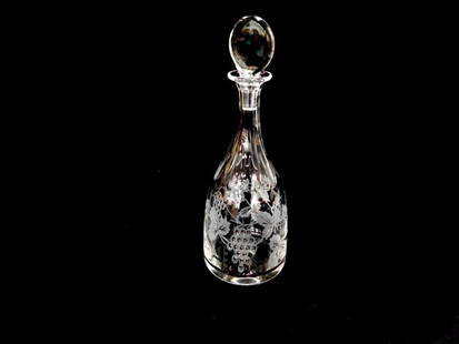 William Yeoward Valentine decanter. Cut and engraved blown glass crystal decanter with grapevine dec: William Yeoward Valentine decanter. Cut and engraved blown glass crystal decanter with grapevine decoration. Signed "William Yeoward" on the underside at edge? Live Auctioneers is now offerin