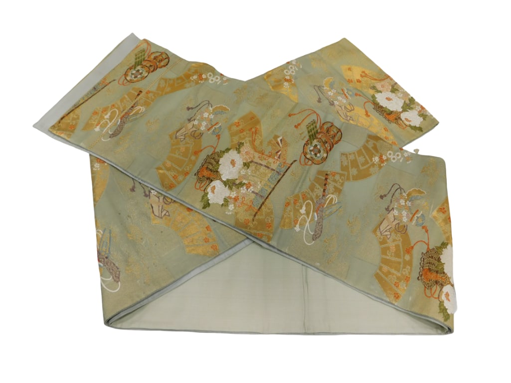 Japanese brocade silk obi. Light green ground silk obi decorated with gold fans and chrysanthemum bl: Japanese brocade silk obi. Light green ground silk obi decorated with gold fans and chrysanthemum blossoms, 13'6" x 12" Live Auctioneers is now offering Live Shipping through them. This i