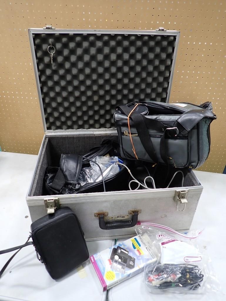 Padded Aluminum Case full of camera accessories including lenses, Video Camera, Tapes, cords etc (1 of 20)