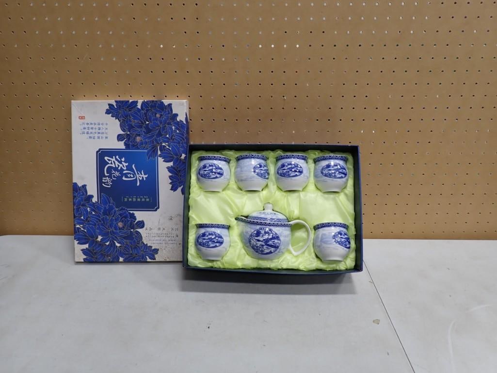 Porcelain Tea or Sake Set: Porcelain Tea or Sake Set Live Auctioneers is now offering Live Shipping through them.? This is an optional payment/shipping system.? If you would like to use the UPS Store as usual, please select 