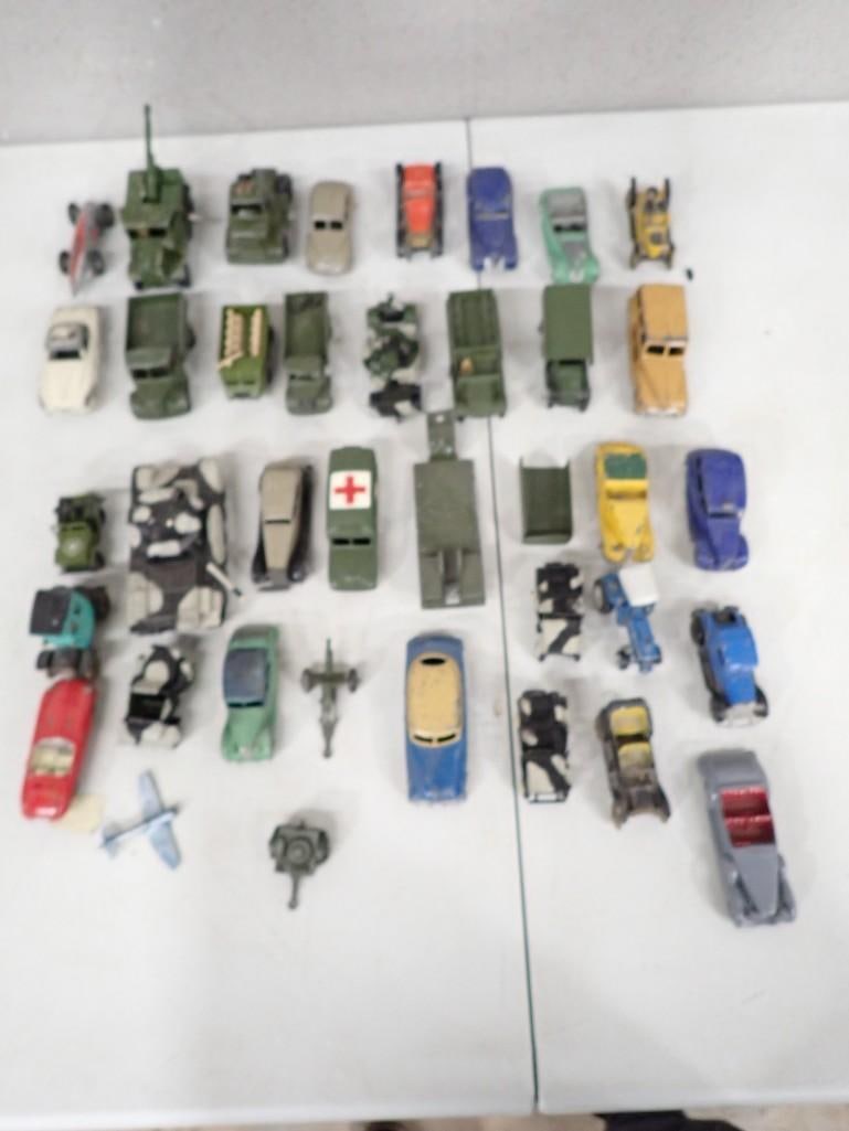 Vintage Toy Cars and Vehicles incl Pressed Steel Military, Race Car, Die Cast Tractor, etc: Vintage Toy Cars and Vehicles incl Pressed Steel Military, Race Car, Die Cast Tractor, etc All pictures are considered part of the description and should be examined carefully by bidders. Live Auction