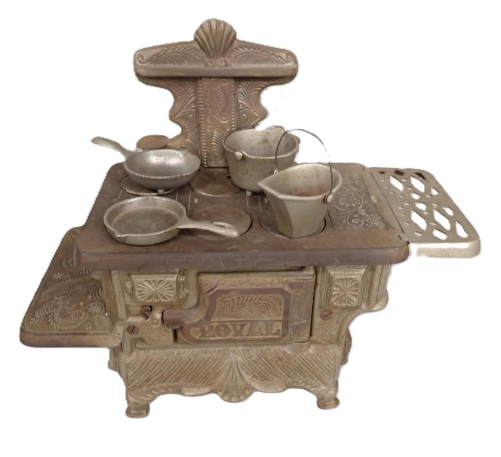 Vintage Children's or Doll Cast Iron Stove with Accessories: Vintage Children's or Doll Cast Iron Stove with Accessories 14x14x6" Live Auctioneers is now offering Live Shipping through them. This is an optional payment/shipping system. If you would like