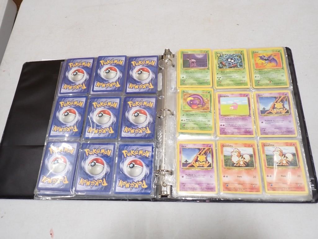 Binder full of assorted Pokemon trading cards (1 of 5)