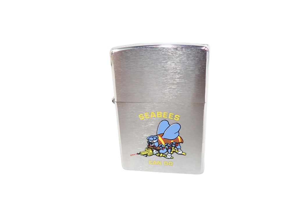 New Zippo Lighter Sea Bees Can Do with Seal Intact: New Zippo Lighter Sea Bees Can Do with Seal Intact 3"x2"x1" All pictures are considered part of the description and should be examined carefully by bidders. Live Auctioneers is now offerin
