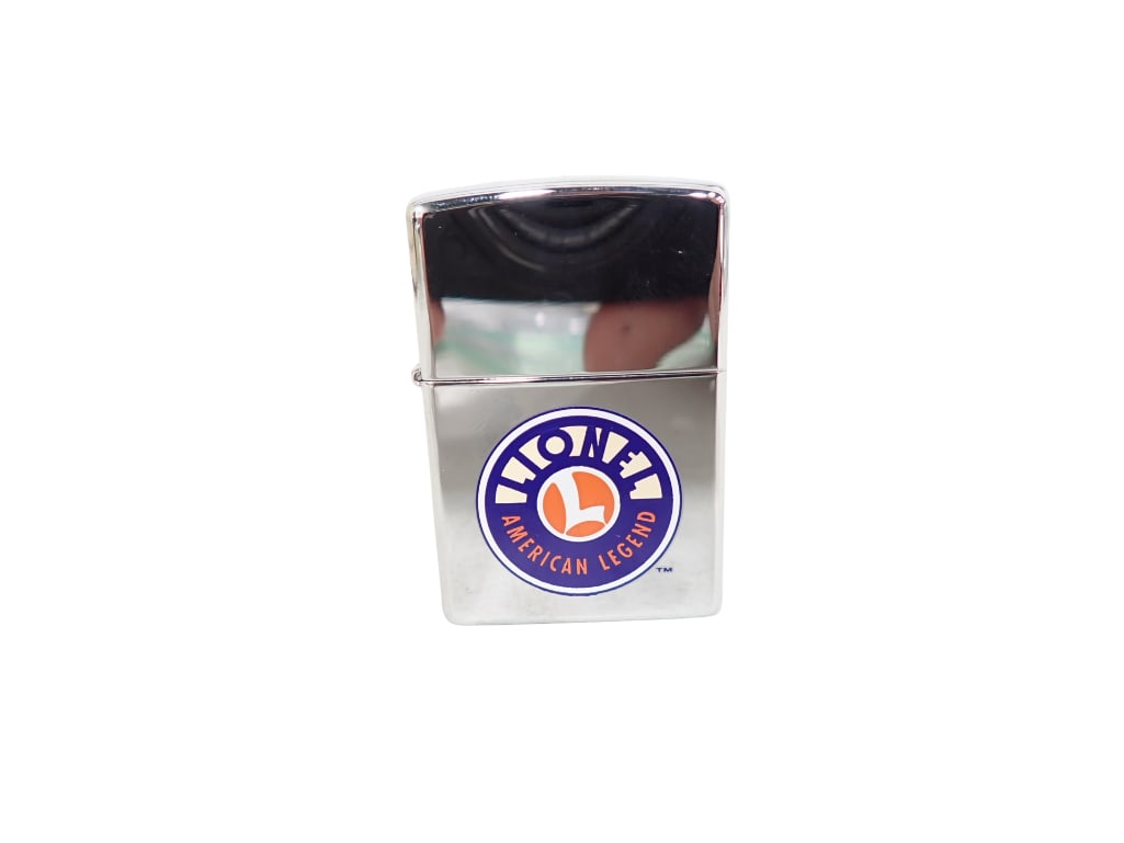 Lionel Trains Zippo Lighter New with Seal Intact: Zippo Lionel Trains Lighter New with Seal Intact 3"x2"x1" All pictures are considered part of the description and should be examined carefully by bidders. Live Auctioneers is now offering 