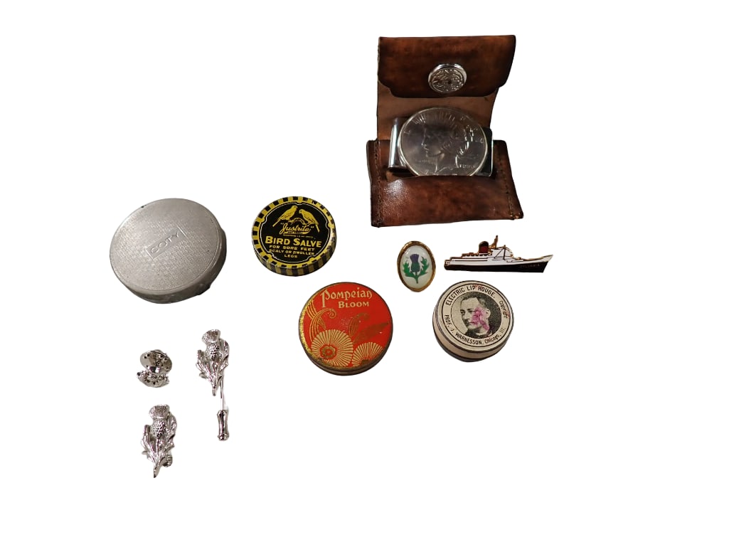 Smalls Lot incl Money Clip, Electric Lip Rouge Tin, Thistle Dug Oral Reverse Paint: Smalls Lot incl 1922 Peace Dollar Money Clip (not a real peace dollar), Electric Lip Rouge Tin, Thistle Dug Oral Reverse Painting under glass of a thistle, Vintage Pompeian Bloom Rouge Pot Tin or Comp