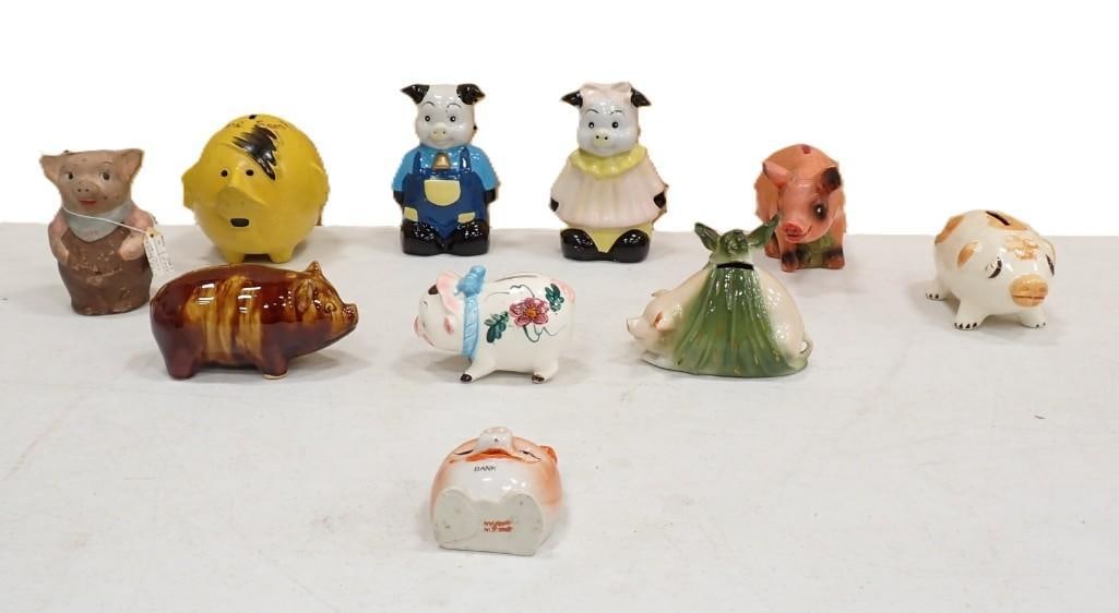 Lot of assorted Piggy Banks including Made in Japan, Ceramic, etc.: Lot of assorted Piggy Banks including Made in Japan, Ceramic, Adolf Hitler the Pig WWII Propaganda,? etc. 6x4x4" All pictures are considered part of the description and should be examined carefull