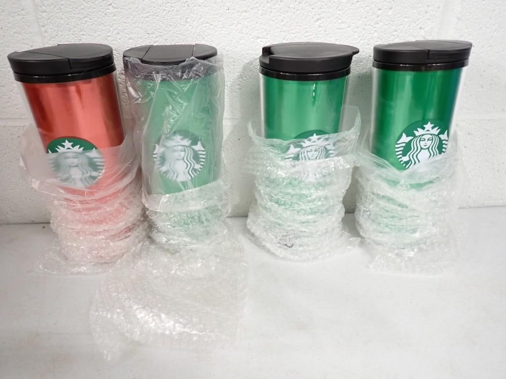 4 New Starbucks Mugs or Cups: 4 New Starbucks Mugs or Cups . Includes 3 Green and 1 RedAll pictures are considered part of the description and should be examined carefully by bidders.Live Auctioneers is now offering Live Shipping 