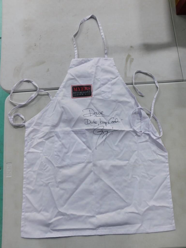 White Apron Signed by Guy Fieri - No COA: White Apron Signed by Guy Fieri - No COA Your food will taste better if you cook with this - you'll be swimming in flavortown! 6x6x4" All pictures are considered part of the description and sh