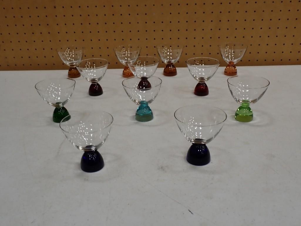 Colored Glass Weighted Bottom Cocktail Drinking Glasses: Colored Glass Weighted Bottom Cocktail Drinking Glasses 4x4x4" All pictures are considered part of the description and should be examined carefully by bidders. Live Auctioneers is now offering Liv