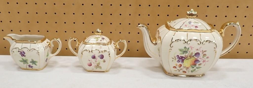 Set of 3 Sadler Made in England Teapot, Creamer / Sugar. Fruit Design: Set of 3 Sadler Made in England Teapot, Creamer / Sugar. Fruit Design 8x6x6" All pictures are considered part of the description and should be examined carefully by bidders. Live Auctioneers is no