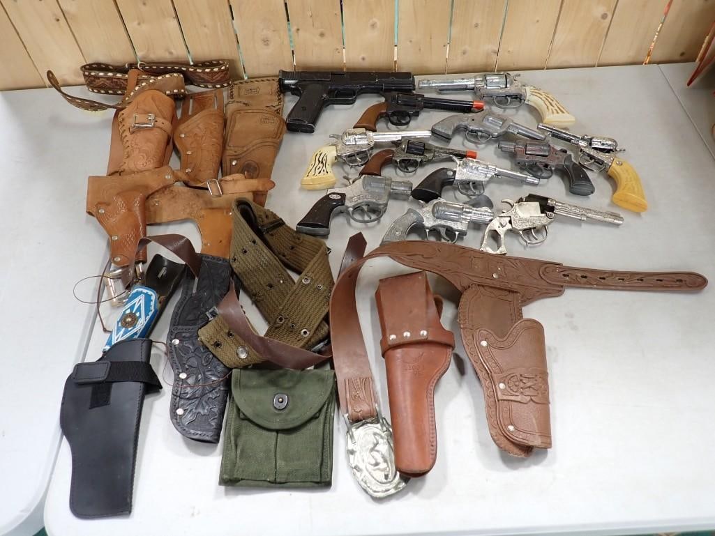 Lot of Vintage Toy Guns and Holsters: Lot of Vintage Toy Guns and Holsters All pictures are considered part of the description and should be examined carefully by bidders. Live Auctioneers is now offering Live Shipping through them. Thi