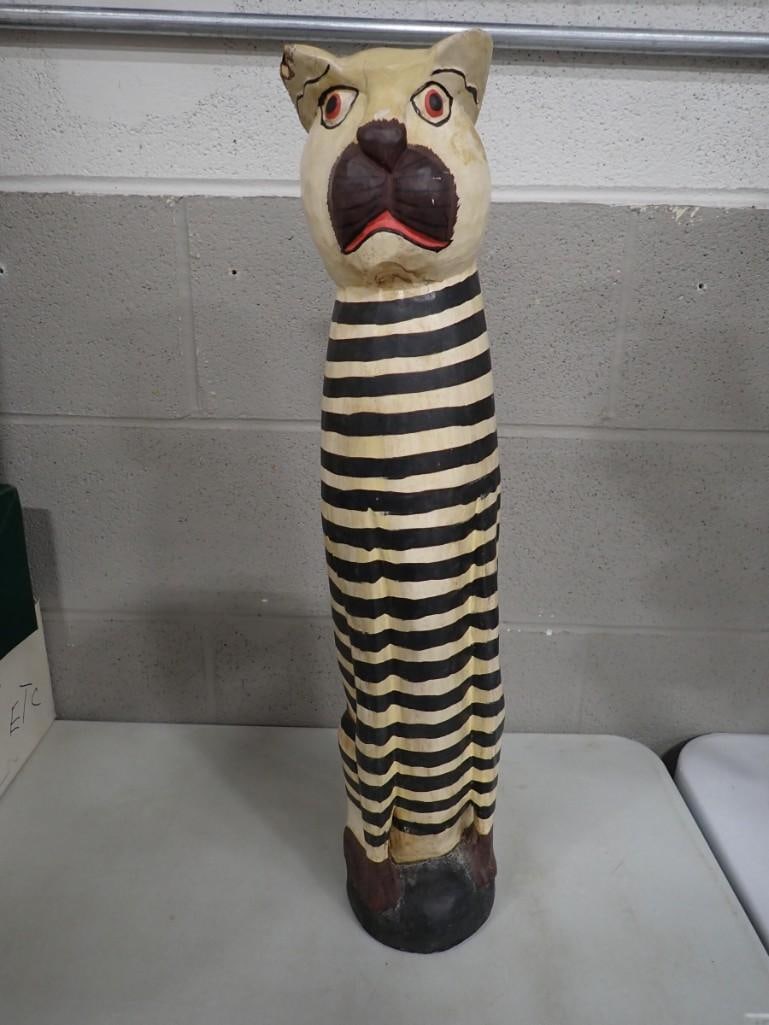Striped Wood Cat Statue: Striped Wood Cat Statue Condition: damaged/chipped earAll pictures are considered part of the description and should be examined carefully by bidders.Live Auctioneers is now offering Live Shipping thr