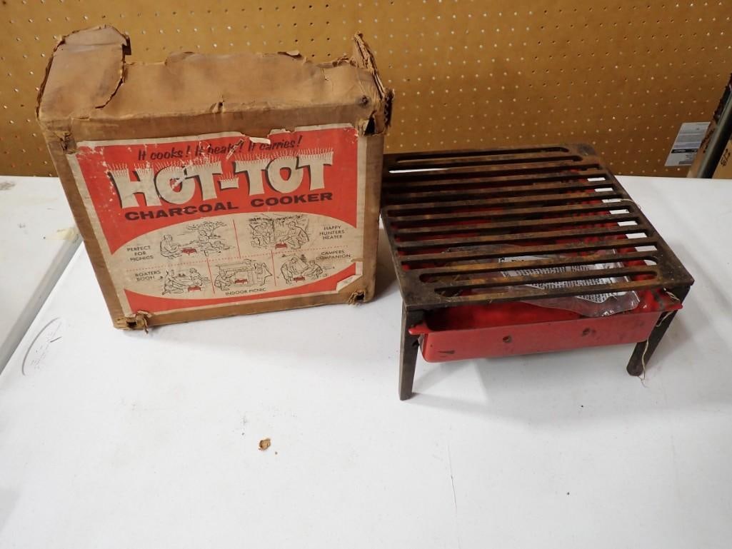 Vintage Hot Tot Charcoal Cooker in Original Box: Vintage Hot Tot Charcoal Cooker in Original Box .? Condition:? 1 leg is broken off All pictures are considered part of the description and should be examined carefully by bidders. Live Auctioneers i