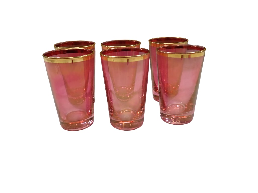 Vintage Cranberry Glass Juice Glasses or Tumblers with Gold Gilt Rims: Vintage Cranberry Glass Juice Glasses or Tumblers with Gold Gilt Rims All pictures are considered part of the description and should be examined carefully by bidders. Live Auctioneers is now offering 