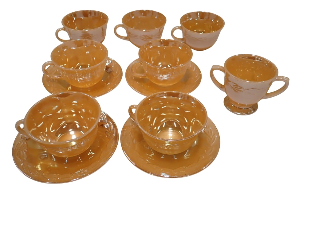 Vintage Fire King Peach Lustre Ware Laurel Leaf Pattern Dishes: Vintage Fire King Peach Lustre Ware Laurel Leaf Pattern Dishes including cups, saucers, sugar bowl All pictures are considered part of the description and should be examined carefully by bidders. Li