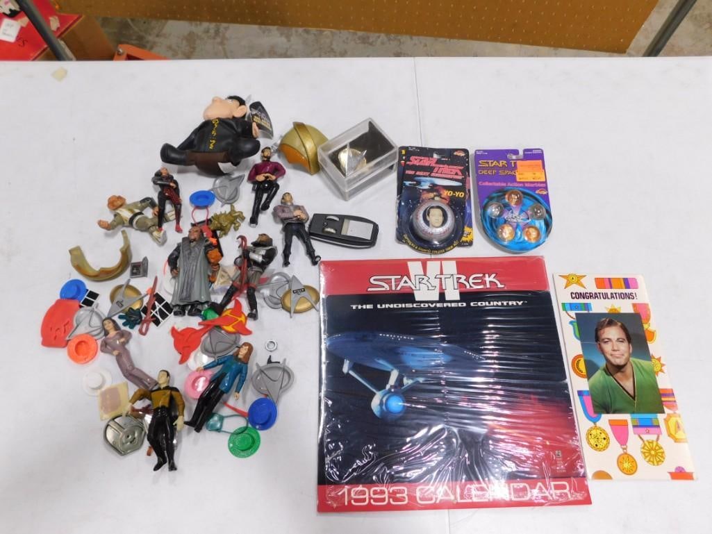 Star Trek Lot including Action Figures, Yo-Yo, Marbles, Calendar, Accessories, etc.: Star Trek Lot including Action Figures, Yo-Yo, Marbles, Calendar, Accessories, etc. All pictures are considered part of the description and should be examined carefully by bidders. Live Auctioneers is