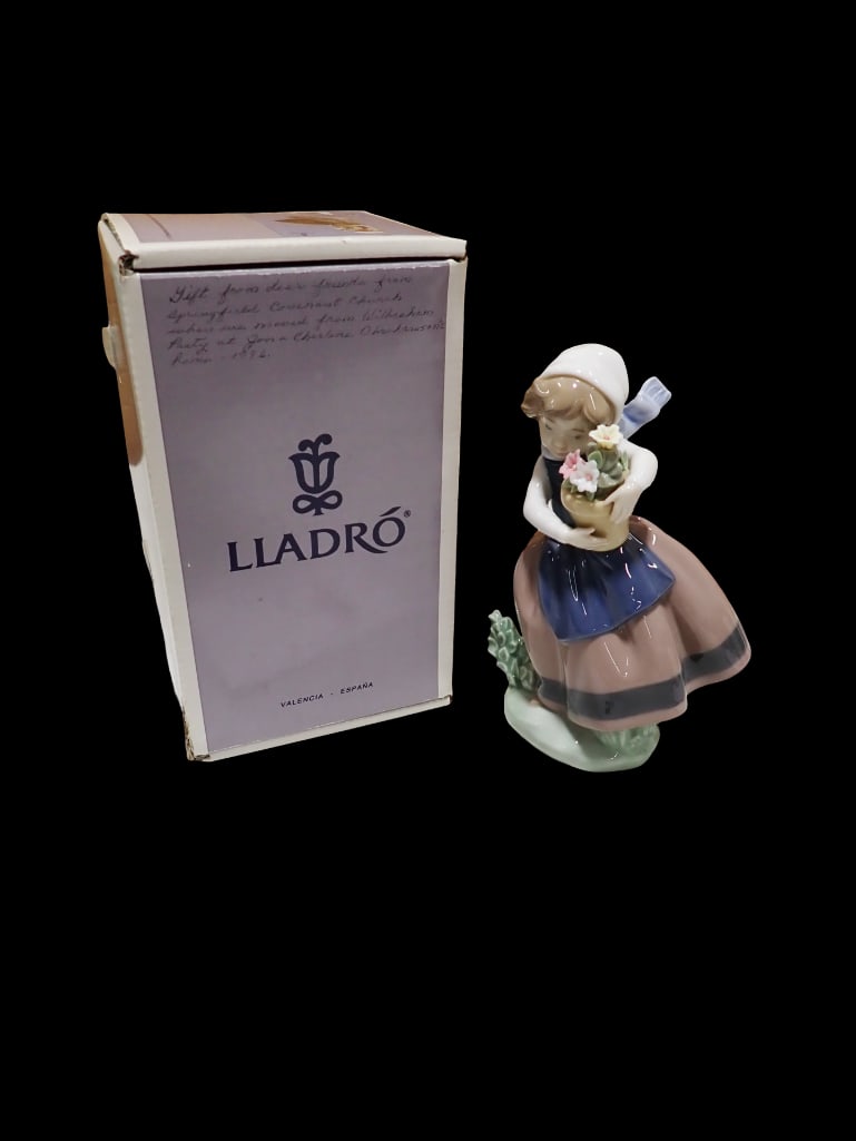 Lladro Spring is Here Porcelain Figurine 5223 in Original Box: Lladro Spring is Here Porcelain Figurine 5223 in Original Box All pictures are considered part of the description and should be examined carefully by bidders. Live Auctioneers is now offering Live Shi