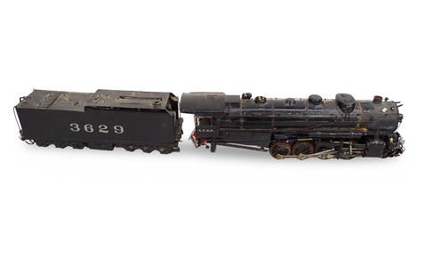Santa Fe Steam Engine #3629 and Tender Unknown Maker: Model Train Santa Fe Steam Engine #3629 and Tender Unknown Maker . Appears to be either cast iron or solid metal. Powered. Untested. 13" x 3"x 3" All pictures