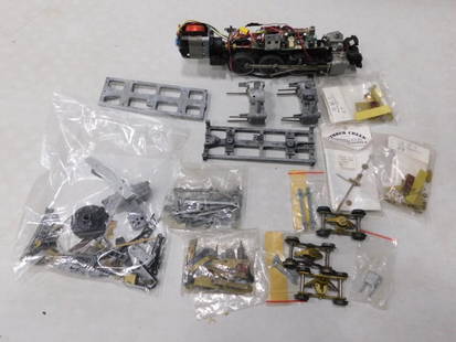 Steam Engine Parts and Pieces incl 1 Steam Engine Frame and Motor, modernized: Steam Engine Parts and Pieces incl 1 Steam Engine Frame and Motor, modernized. Untested. Mostly metal, some brass. Please see photos. 12"x3"x3" All pictures are co