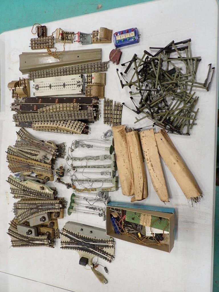 Large lot of Marklin and Hornby Track, Switches, Accessories, Parts, and Misc Pieces. HO Scale: Large lot of Marklin and Hornby Track, Switches, Accessories, Parts, and Misc Pieces. HO Scale. Pieces are in good to decent condition. Heavy lot. At least 6 switches. Pl