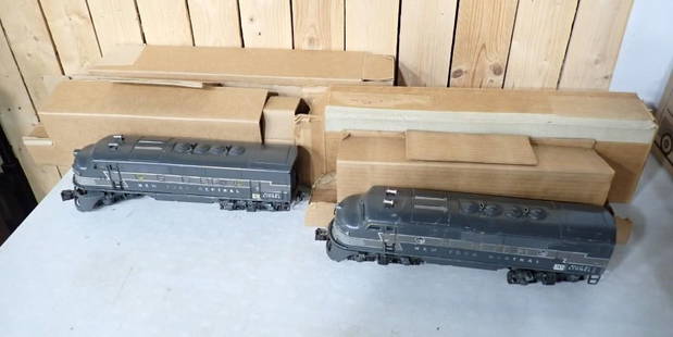 New York Central F3 Engines 2344 P 2344T including 1 powered engine and 1 dummy. 1 original: New York Central F3 Engines 2344 P 2344T including 1 powered engine and 1 dummy. 1 original box and 1 nice reproduction box. Overall nice condition. Normal, played with
