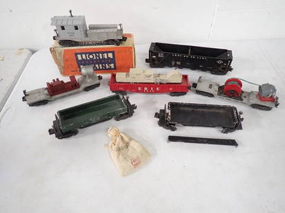 Lot of 7 Lionel freight cars. Overall decent condition. Possible broken parts and: Lot of 7 Lionel freight cars. Overall decent condition. Possible broken parts and missing pieces. Car numbers 2419, 6436, automatic dump car in green 3459 with bag of coal,