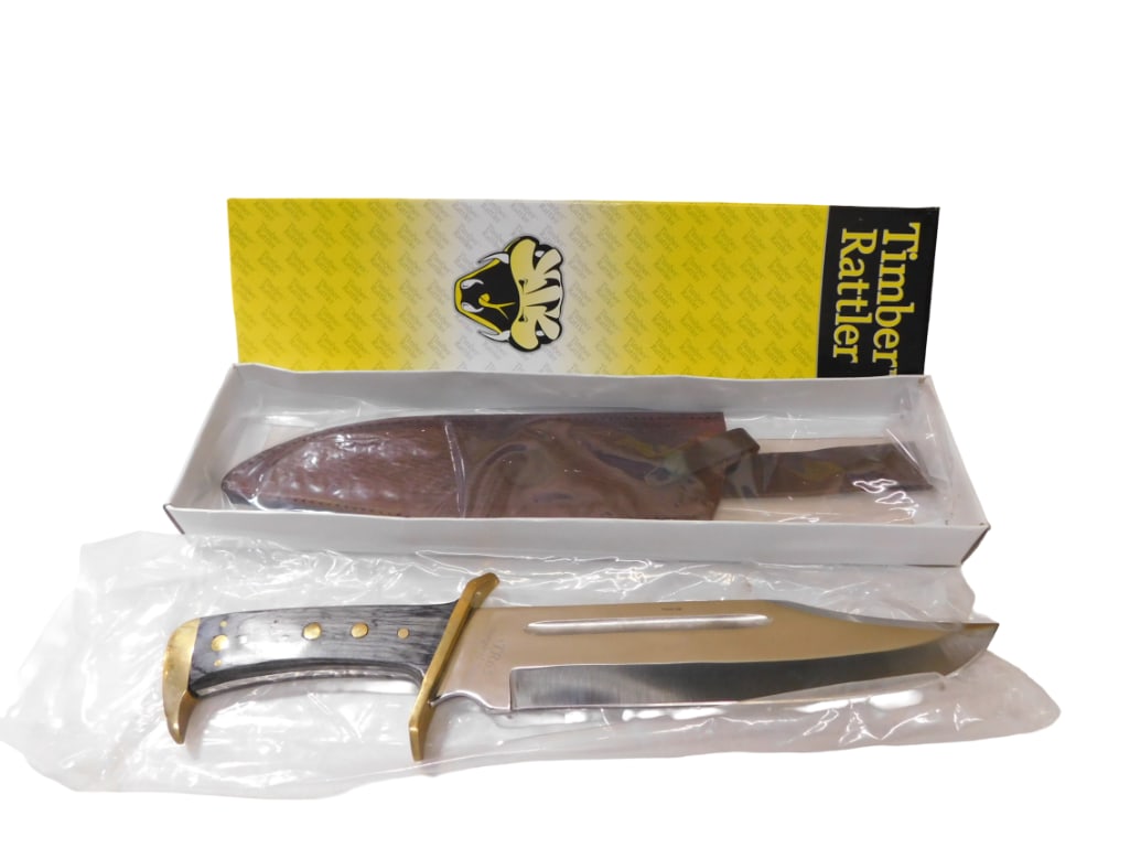 Thunder Rattler Knife with Sheath New in Box 16" Total Length: Thunder Rattler Knife with Sheath New in Box 16" Total Length All pictures are considered part of the description and should be examined carefully by bidders. Live Auctioneers is now offering Live