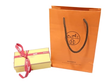 Group of Hermes; Yellow Rectangular Gift Box with Red Parfums d'Hermes Ribbon and Orange Shopping Ba