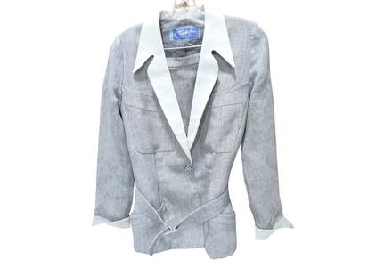 Thierry Mugler skirt Suit. Grey Linen Skirt, Jacket and Belt. JacketTrrimmed at the Collar and Cuffs: Thierry Mugler skirt suit. Grey linen skirt, jacket and belt. Jacket trimmed at the collar and cuffs in white pique A