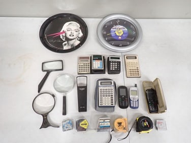Misc. Lot including Marilyn Monroe Clock, Vintage Calculators, Magnifying Glasses, Tape Measures