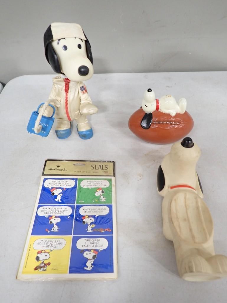 Vintage The Peanuts Snoopy Toys incl Snoopy Astronaut, 1950s Snoopy Soap Dish, 1960s Snoopy Football: Vintage The Peanuts Snoopy Toys incl Snoopy Astronaut, 1950s Snoopy Soap Dish, 1960s Snoopy Football Coin Bank, and Hallmark Snoopy Seals All pictures are considered part of the description and should
