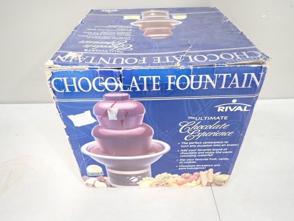 Rival Chocolate Fountain in Original Box: Rival Chocolate Fountain in Original Box. Condition: box has damage. Item is unchecked. All pictures are considered part of the description and should be examined carefully by bidder