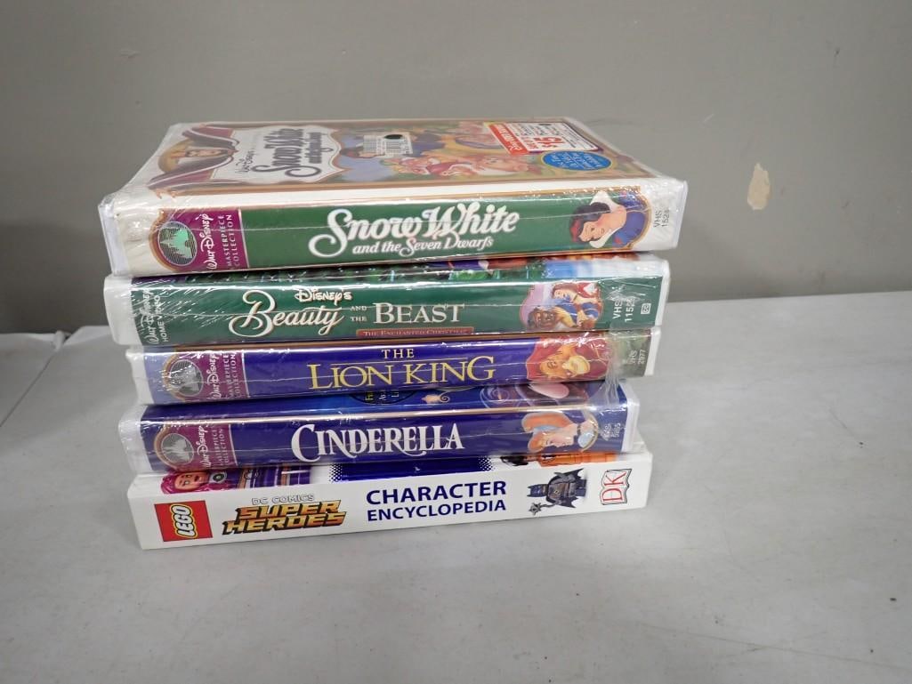 Sealed Walt Disney Movies - Sow White, Beauty and the Beast, Lion King, Cinderella and Lego DC Comic (1 of 3)