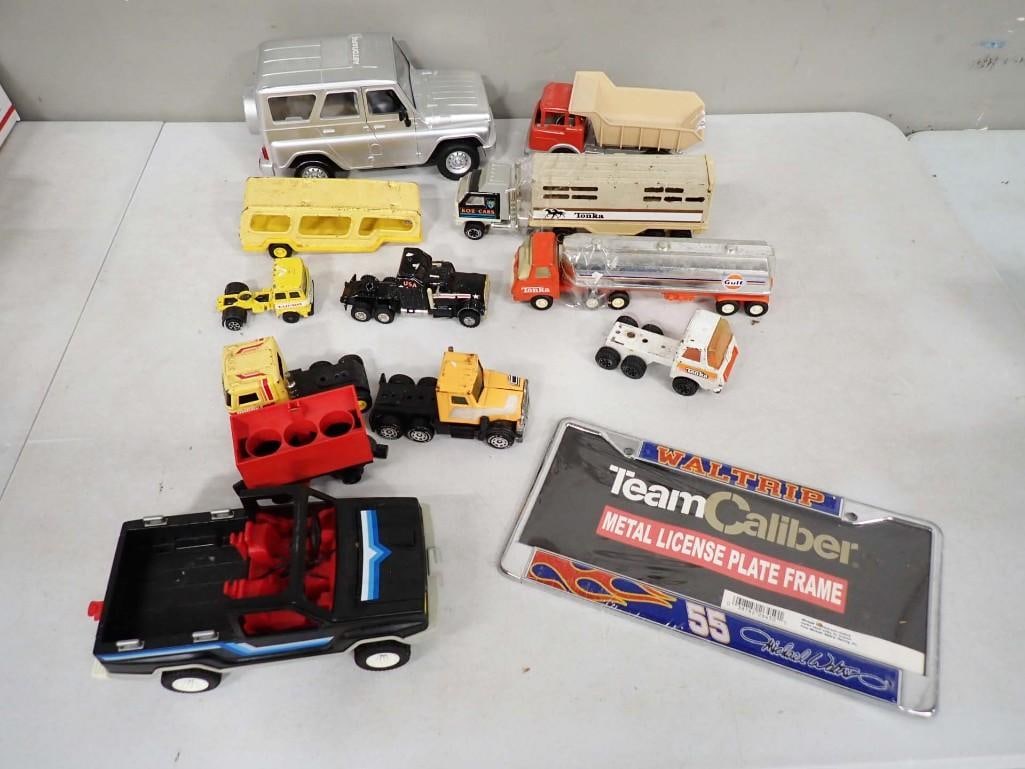 Lot of Toy Trucks and Vehicles incl Tonka, Etc. Also includes a Waltrip Licenses Plate Holder: Lot of Toy Trucks and Vehicles incl Tonka, Etc. Also includes a Waltrip Licenses Plate Holder All pictures are considered part of the description and should be examined carefully by bidders. Live Auct