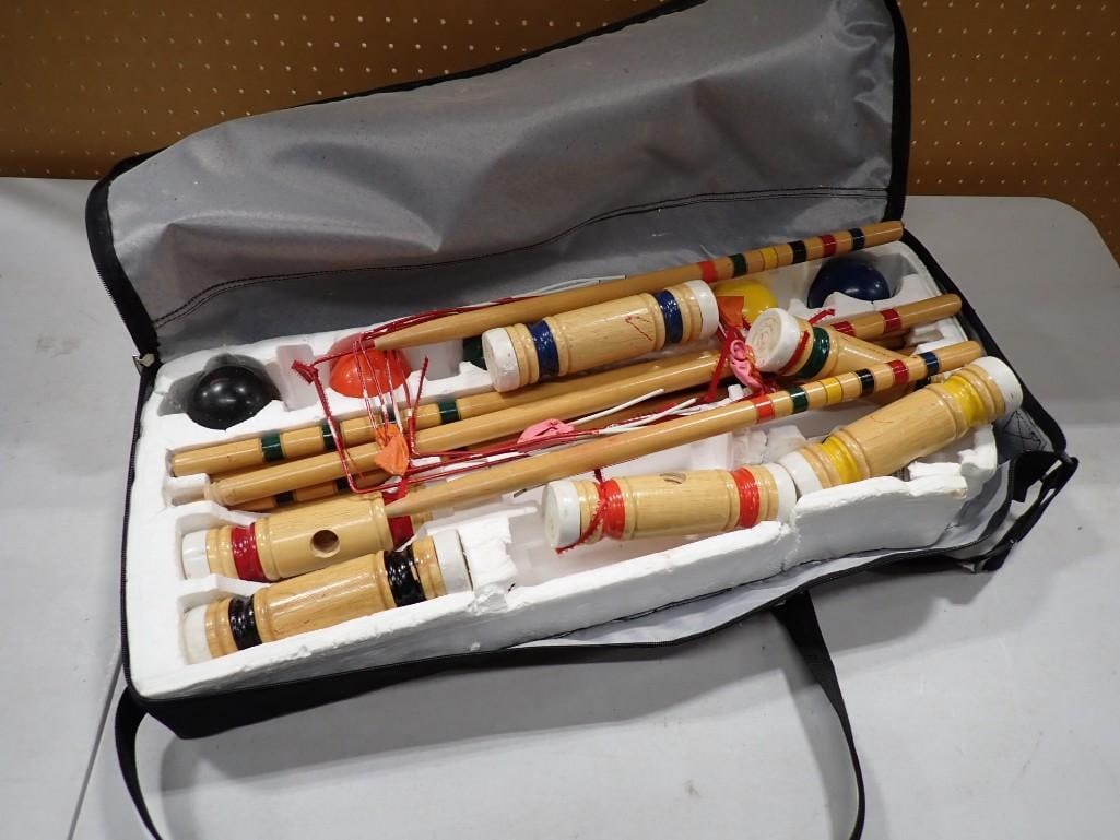 Croquet Set with Case: Croquet Set with Case . Includes everything that you see in the pictures All pictures are considered part of the description and should be examined carefully by bidders. Live Auctioneers is now 