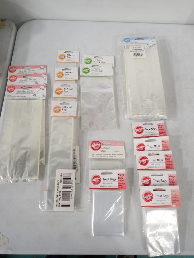 New in Package Wilton Kitchen Lot including Party Bags, Pretzel Bags, Lollipop Bags, Treat Bags, etc: New in Package Wilton Kitchen Lot including Party Bags, Pretzel Bags, Lollipop Bags, Treat Bags, etc All pictures are considered part of the description and should be examined carefully by bidders. Li