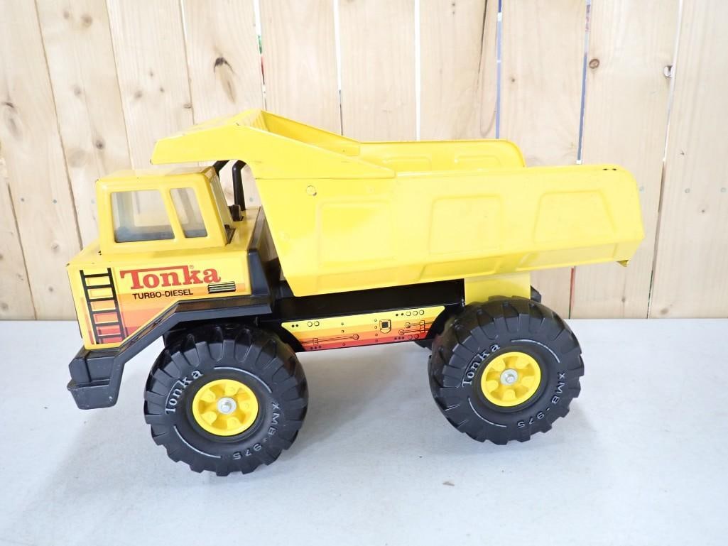 Tonka Pressed Steel Dump Truck: Tonka Pressed Steel Dump Truck 16x10x8" All pictures are considered part of the description and should be examined carefully by bidders. Live Auctioneers is now offering Live Shipping through them