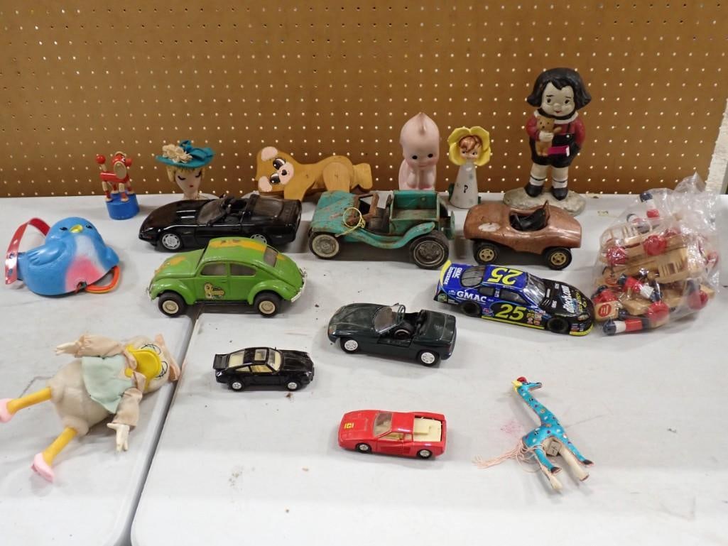 Vintage Toy Lot etc. including Cars, Daisy Duck, Kewpie, Figurines, animals, etc.: Vintage Toy Lot etc. including Cars, Daisy Duck, Kewpie, Figurines, animals, etc. All pictures are considered part of the description and should be examined carefully by bidders. Live Auctioneers is n