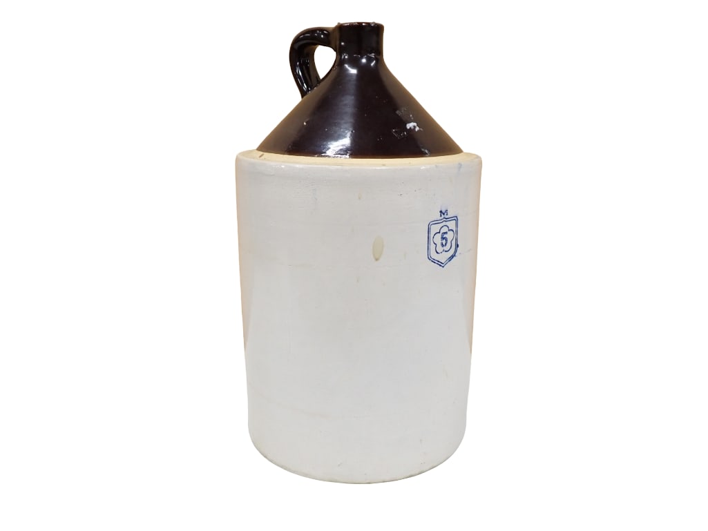 Nelson McCoy 5 Gallon Stoneware Jug: Nelson McCoy 5 Gallon Stoneware Jug 21"x11" diameter All pictures are considered part of the description and should be examined carefully by bidders. Live Auctioneers is now offering Live Sh