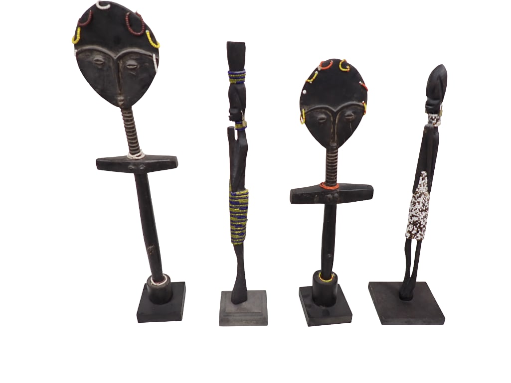 Lot of 4 Carved African Asanti and Maasai Statues: Lot of 4 Carved African Asanti and Maasai Statues . Tallest is 15" All pictures are considered part of the description and should be examined carefully by bidders. Live Auctioneers is now offering