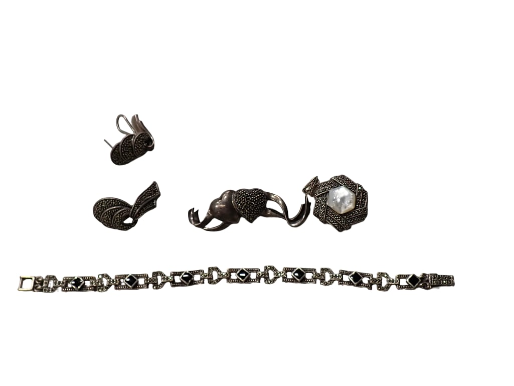 Judith Jack Sterling Silver Jewelry and More: Judith Jack Sterling Silver Jewelry and More All pictures are considered part of the description and should be examined carefully by bidders. Live Auctioneers is now offering Live Shipping through the