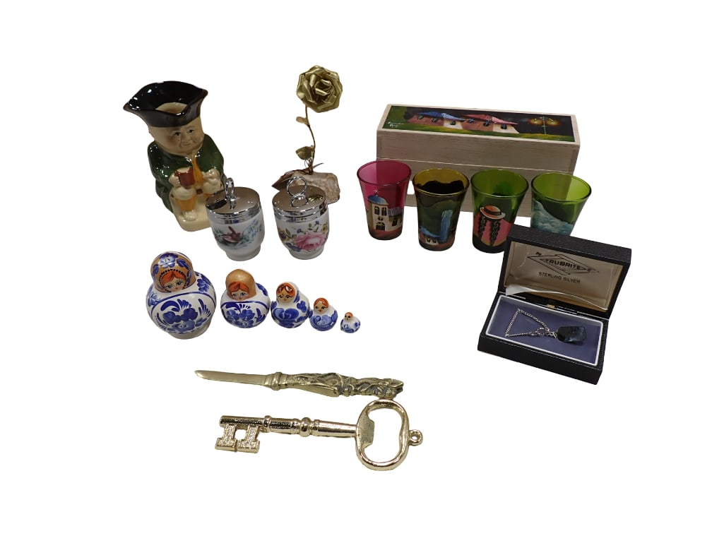 Sterling Silver Key Fob, Nesting Dolls, Tony Wood Pitcher, and more: Sterling Silver Key Fob, Nesting Dolls, Tony Wood Pitcher, and more All pictures are considered part of the description and should be examined carefully by bidders. Live Auctioneers is now offering