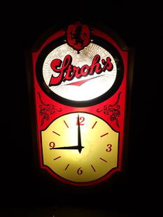 Vintage Stroh's Beer Lighted Bar Clock Works: Vintage Stroh's Beer Lighted Bar Clock Both the Light and the clock work. 18x10x4" All pictures are considered part of the description and should be examined carefully by bidders. Live