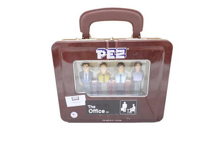 The Office Dunder Mifflin Pez Dispenser Gift Set: The Office Dunder Mifflin Pez Dispenser Gift Set in a Briefcase Shaped Carrying Case. All pictures are considered part of the description and should be examined carefully by bidders. Live Auctioneer