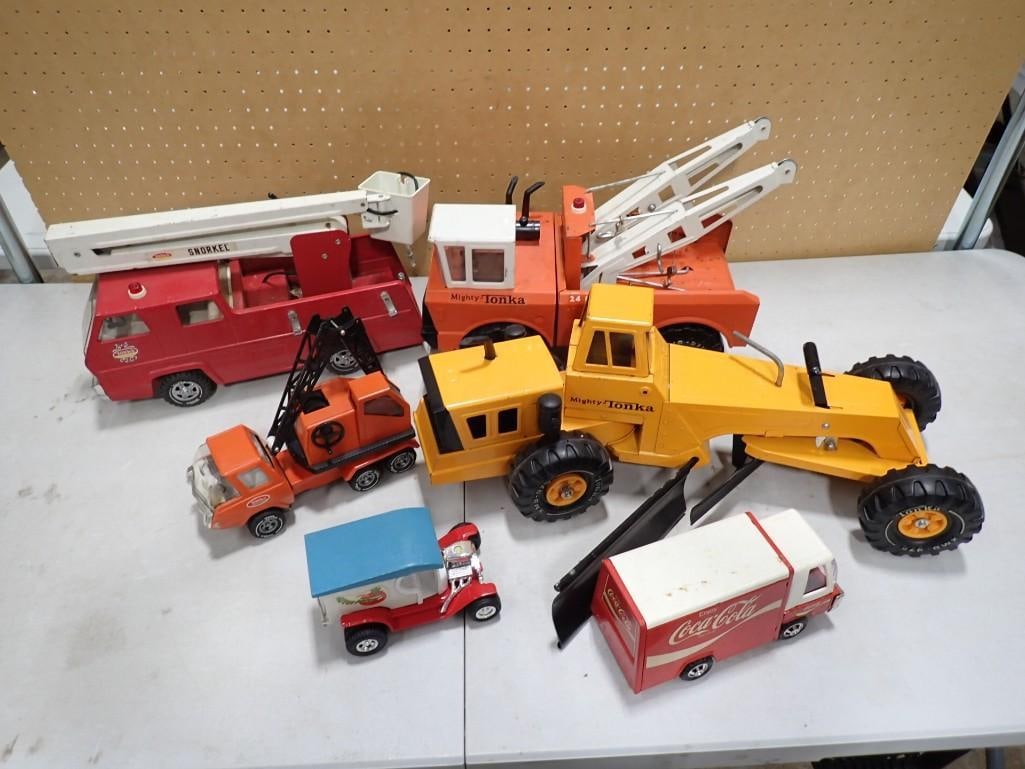 Lot of Pressed Steel Trucks, etc. Including Tonka Snorkel, Mighty Tonka, Coca Cola, Apple Peeler, et: Lot of Pressed Steel Trucks, etc. Including Tonka Snorkel, Mighty Tonka, Coca Cola, Apple Peeler, etc All pictures are considered part of the description and should be examined carefully by bidders. L
