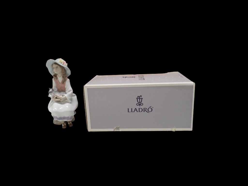 Lladro Daydreams 6400 Porcelain Figurine with Original Box: Lladro Daydreams 6400 Porcelain Figurine with Original Box All pictures are considered part of the description and should be examined carefully by bidders. Live Auctioneers is now offering Live Shippi