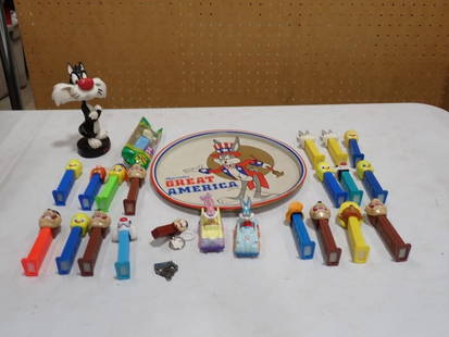 Vintage Toy Lot including Bugs Bunny Great America Tin, Sylvester Figurine, Pez Dispensers, etc.: Vintage Toy Lot including Bugs Bunny Great America Tin, Sylvester Figurine, Pez Dispensers, etc. All pictures are considered part of the description and should be examined carefully by bidders. Live A