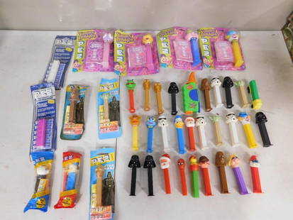 Pez Lot including Rare Peppermint Pez, Star Wars, Yummy Bubbles, Smurfs, Muppets, Disney, etc.: Pez Lot including Rare Peppermint Pez, Star Wars, Yummy Bubbles, Smurfs, Muppets, Disney, etc. All pictures are considered part of the description and should be examined carefully by bidders. Live Auc