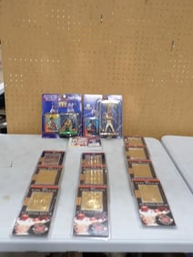 Mark McGwire Sports lot including Starting Lineup Figurines, Mac Attack, 23Kt Gold Cards, etc.